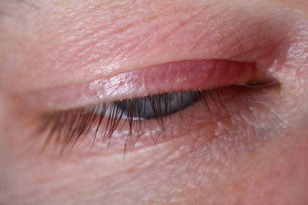 istock Male eye with blue pupil and eyelashes close up. 1280059277