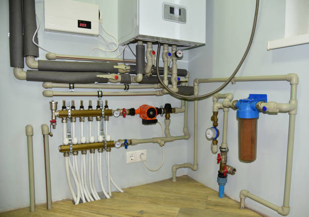 istock Independent heating system in boiler room at home. Domestic water supply system 1280061467