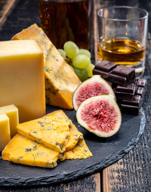 istock British matured yellow cheese blue shropshire, smoked cheddar and fresh figs close up 1280061730