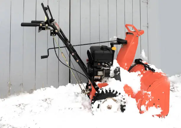 a gas powered snow blower makes winter driveway clearing easy