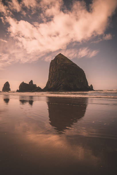 istock Colorful reflections of Haystack Rock, Cannon Beach, Oregon 1280064015