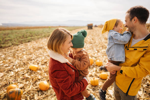 istock Enjoying autumn on a pumpkin field 1280064955