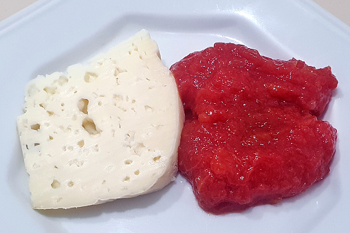 Goiabada is a typical brzilian sweet made with the fruit of guava and a lot of sugar. Minas cheese.