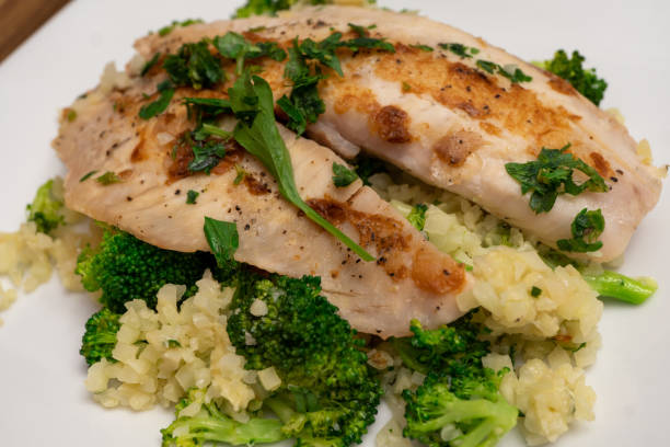 istock Cauliflower Rice with Broccoli and Tilapia, and topped with Parsley 1280068734