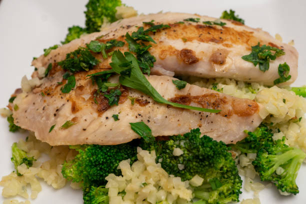 istock Cauliflower Rice with Broccoli and Tilapia, and topped with Parsley 1280068812
