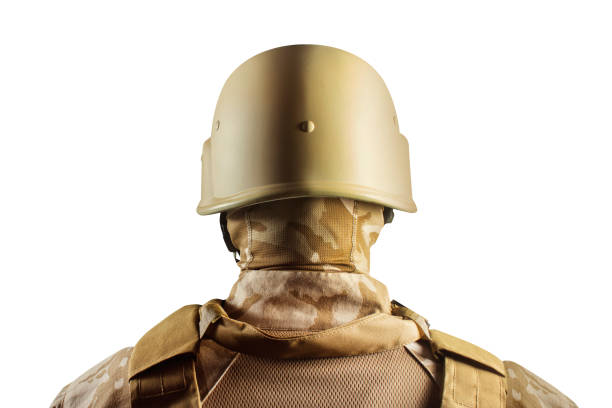 istock Soldier in desert uniform standing in helmet back view. 1280069821