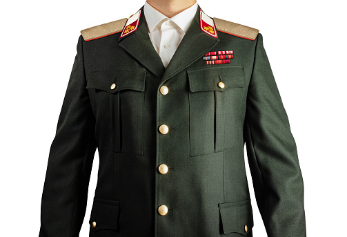 Isolated photo on white background of a military officer in uniform suit, torso view.