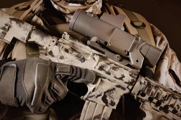istock Fully equipped desert soldier holding automatic rifle. 1280071839