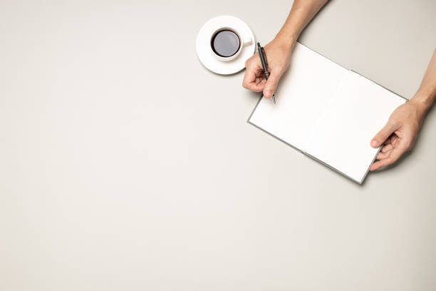 istock business planning conceptual. above view for a workplace with notepad and coffee cup. workplace flat lay 1280072630