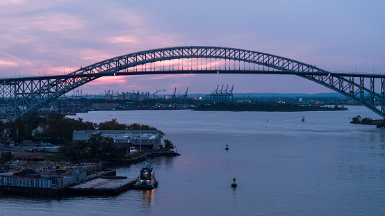 Aerial scenic views of the Bayonne Bridge connecting New Jersey, and New York State at sunset.