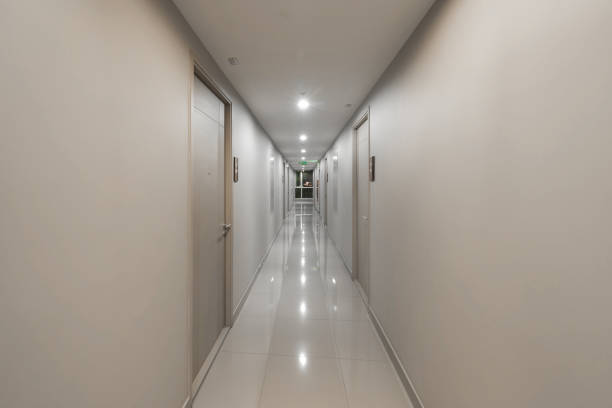 istock Empty condo, hotel or apartment corridor hall way in condominium building, modern interior design decoration room. Walkway 1280089393