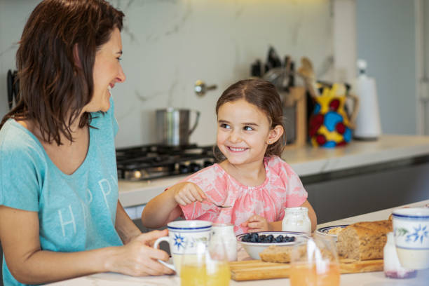 istock Happy family enjoying breakfast 1280099377