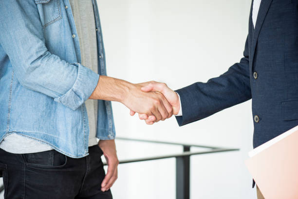 istock Close-up of handshake 1280099391