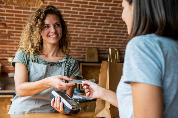 istock Woman doing online payment with credit card 1280100052