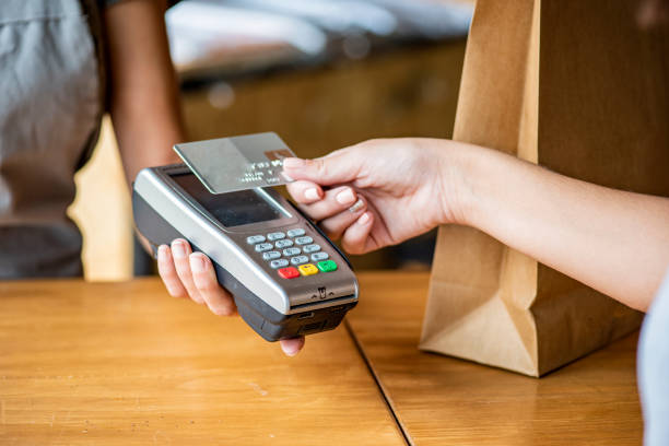 istock Customer doing online payment with credit card 1280100073