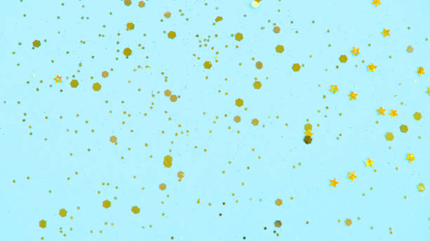 istock Gold glitter on blue background. Holiday abstract 1280100379