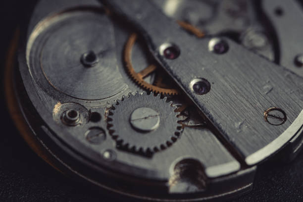 istock Old clockwork dirty with dust and lubricating oil. Selective focus. Shallow depth of field. Toned 1280101252