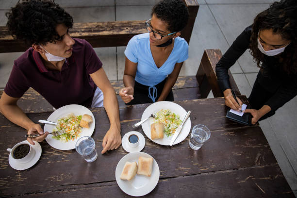 istock Outdoor Dinning During Covid-19 1280102822