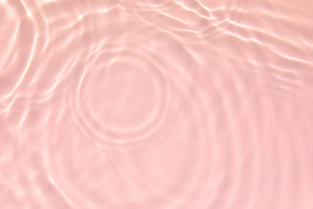 istock pink transparent clear water surface texture summer background 1280103714