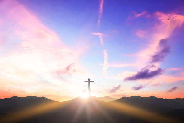istock Christian cross concept: Silhouette cross on  mountain sunset background 1280103965