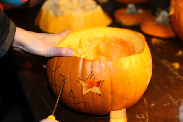 istock Pumpkin carving for Halloween 1280107458