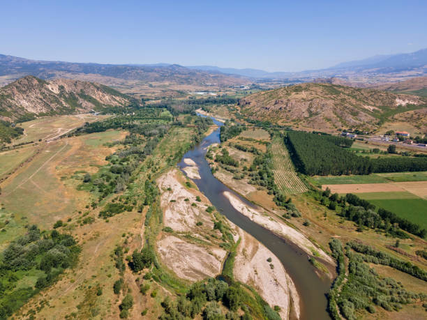 istock Struma river passing through the Petrich valley, Bulgaria 1280107827