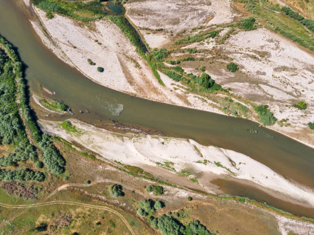 istock Struma river passing through the Petrich valley, Bulgaria 1280107850