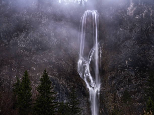 istock Waterfall in rocky mountains of Slovenia. 1280109815
