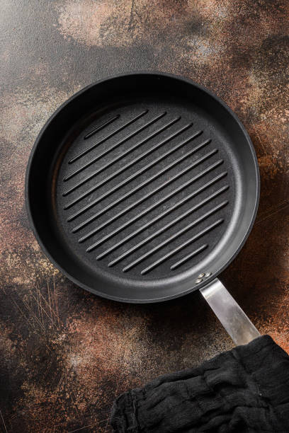 istock top view of empty grill pans on metal rustic table top view 1280110848