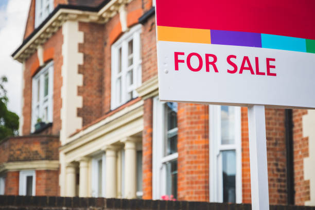 For Sale sign displayed outside a terraced house in Crouch End, London For Sale estate agent sign displayed outside a terraced house in Crouch End, London for sale sign photos stock pictures, royalty-free photos & images