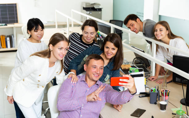 istock successful interracial business team making selfie 1280124064