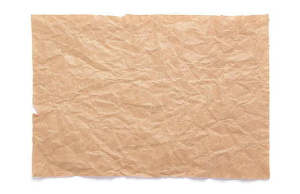istock wrinkled paper at wooden plank wall or table 1280124665
