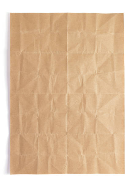 istock wrinkled paper at wooden plank wall or table 1280124789