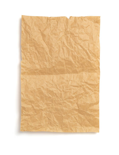 istock wrinkled paper at wooden plank wall or table 1280125396