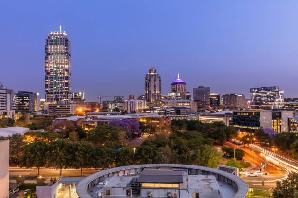 istock Sandton City centre cityscape at dusk 1280125969