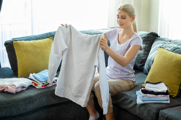 istock Young woman preparing and choosing clothes 1280126046