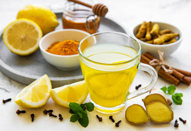 istock Energy tonic drink with turmeric, ginger, lemon and honey 1280128095