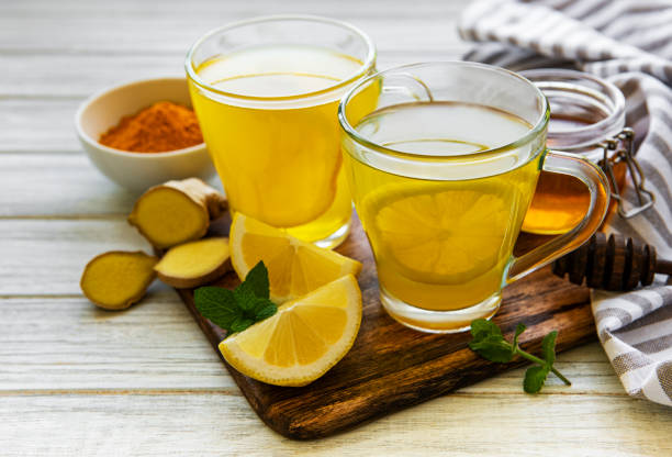 istock Energy tonic drink with turmeric, ginger, lemon and honey 1280128098