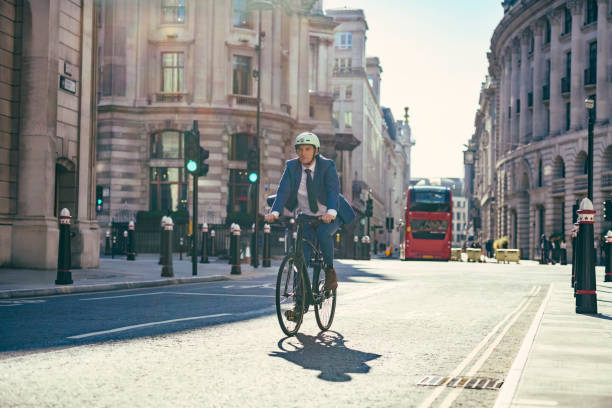 istock British businessman commuting to work by bicycle 1280128196