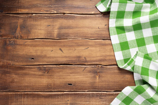 istock cloth napkin or tablecloth at rustic wooden plank board table background 1280128331