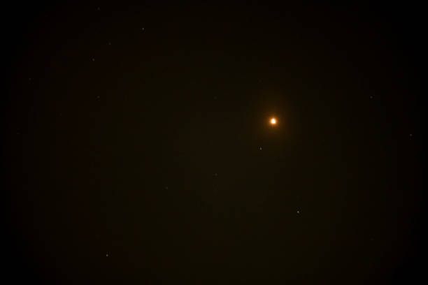 Computer Generated Abstract Space Scene with Glowing Nebulae and Planets