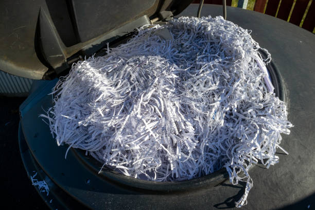 istock recycling bin full of shredded paper 1280132751