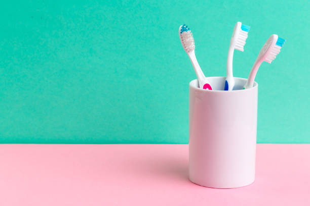 istock Toothbrushes in glass on the table. High quality photo 1280133775