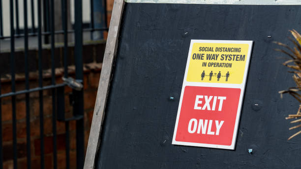 istock Social distancing exit only sign at a pub during a pandemic 1280135295