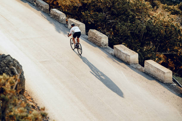 istock Cyclist riding on his bicycle at coastal road 1280140206