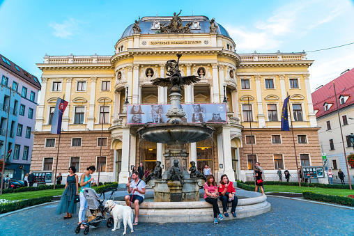 Locals and tourists alike rest in a monumental fountain in front of the Slovak National Theatre on Hviezdoslavovo Square. This neo-Renaissance building was designed by two Viennese architects in the nineteenth century, and currently holds inside plays, operas, ballets and dances. In its facade you can see busts of important cultural figures, such as Mozart, Shakespeare or Goethe, among others.