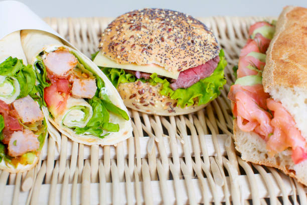 Photo of wrap sandwich and mouth-watering burger stock photo