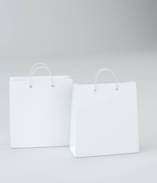istock White paper bags for luxury store on studio background. Template ready for your design. 3d illustration. 1280145922