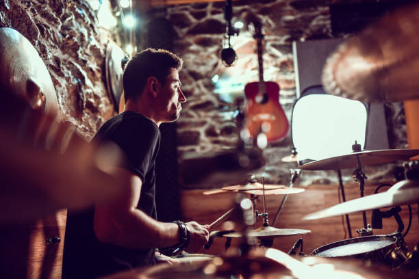 istock Drummer Working On His Rudiments In Music Studio 1280149786