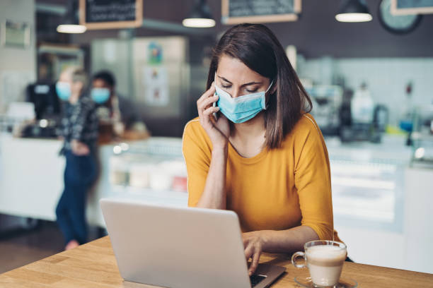 istock Business owner with cell phone and laptop 1280151222